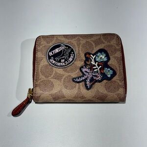 Coach Small Zip Around Wallet In Signature
Canvas With Patches